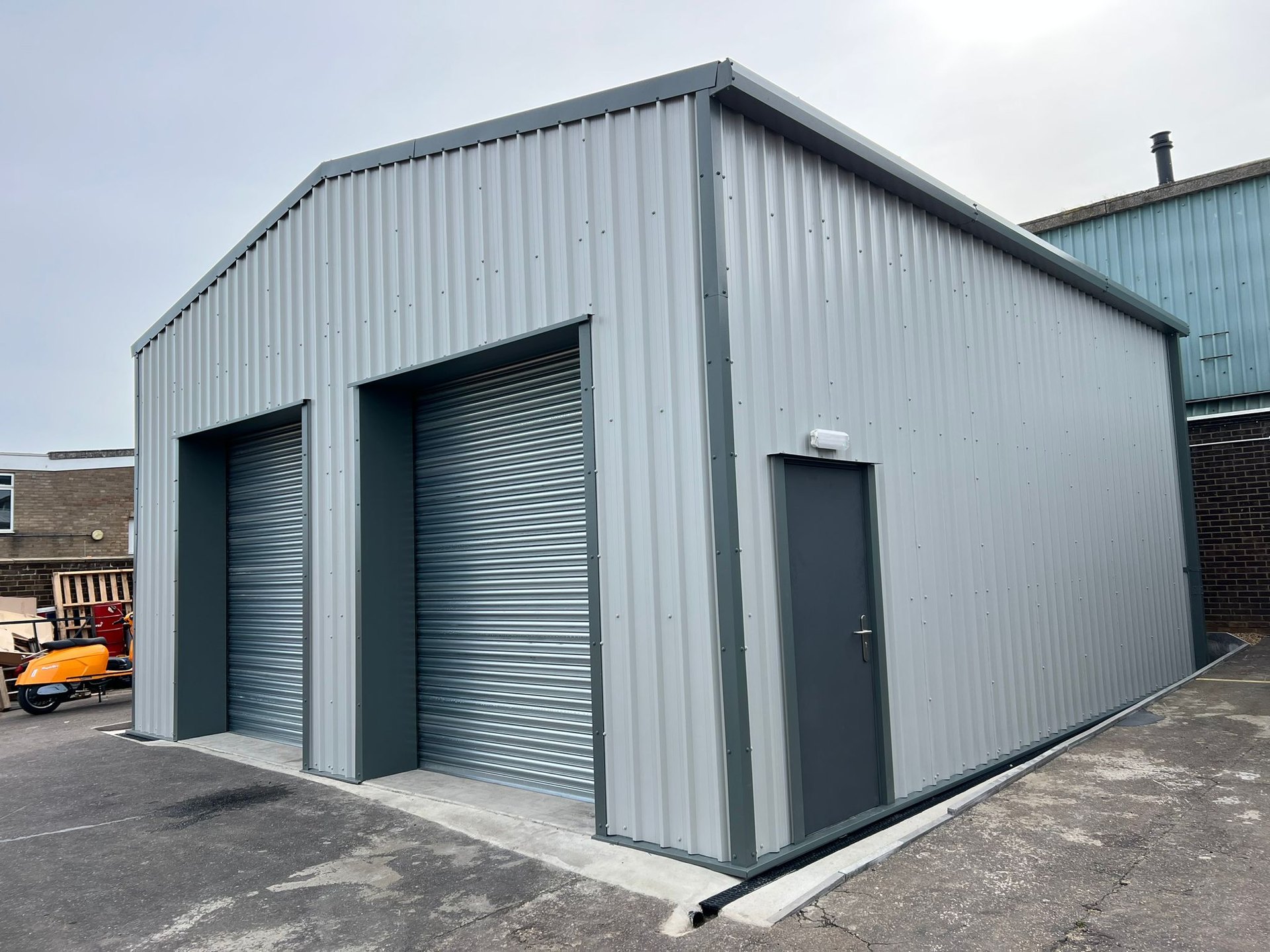 commercial grey steel workshop building roller doors
