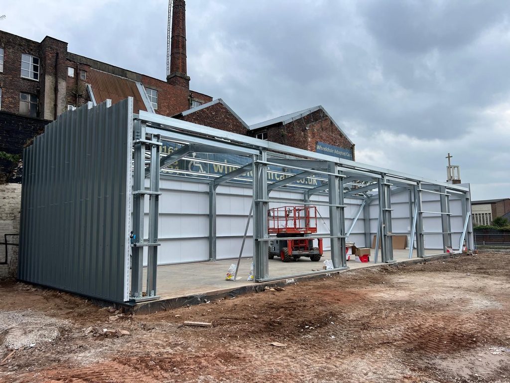 Steel Building Gallery commercial multi bay steel workshop part clad exterior